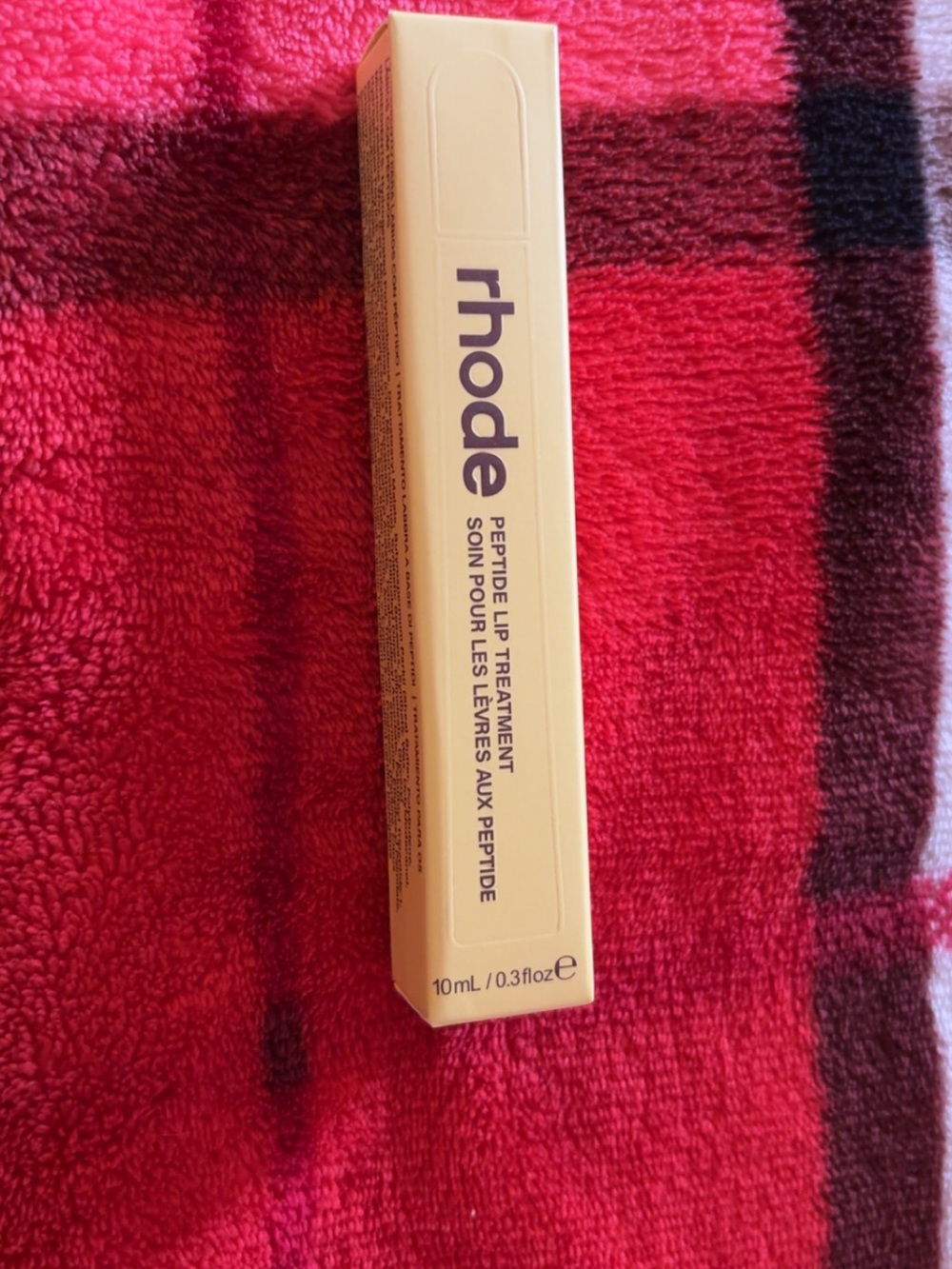 rhode Peptide Lip Treatment — caramelized banana